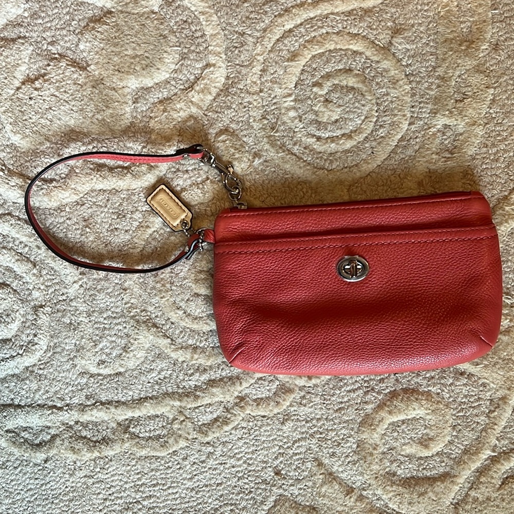 Pink coach leather wristlet